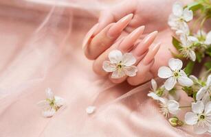 Elegant pastel pink natural manicure. photo