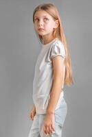 Portrait of cute little girl with long light hair photo