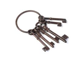 Old rusty keys isolated photo