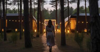 AI generated A Serene Evening Walk in the Pines, Close to a Warmly Illuminated Lounge Area by a Forest Cabin photo