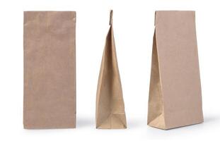 Brown paper bag packaging template isolated on white background photo