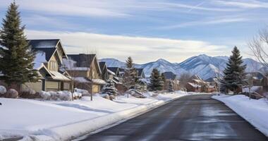 AI generated Winter's Embrace - A Neighborhood Street with Houses Overlooking a Snow-Covered Mountain Under a Cloudy Sky photo