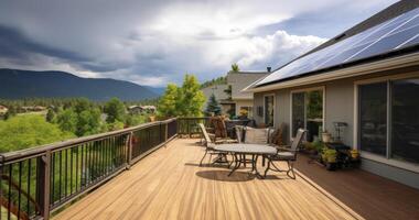 AI generated A Home's Deck with a View of Solar Panels and Mountains, Complete with Cozy Furniture and Stairs to the Yard photo