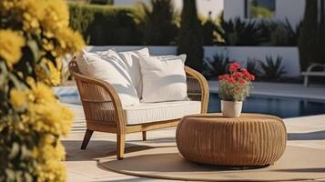 AI generated A Comfortable Armchair, Pouf-Turned-Table, and Stylish Wicker Couch in an Outdoor Setting photo