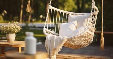 AI generated A Peaceful Swing with a Pillow on a Patio, Paired with Wicker Baskets and a Blanket photo