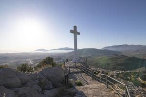 The Cross of the Castle of Santa Catalina. It is an interesting viewpoint with a cross from which can see the entire city of Jaen and its surroundings. photo