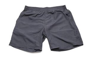negro Deportes pantalones cortos aislado con blanco antecedentes. concepto de cómodo ropa. foto