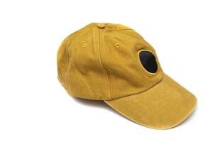 Mustard colored baseball cap, isolated on white background. For mockups. photo