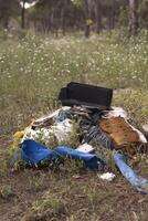 Garbage in nature, in a pine forest. Domestic pollution is becoming more serious, with an overpopulation. photo