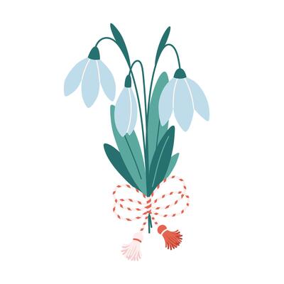 Snowdrop flower with Martisor talisman. Traditional accessory for holiday of early spring in Romania and Moldova