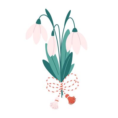 Snowdrop flower with Martisor talisman. Traditional accessory for holiday of early spring in Romania and Moldova