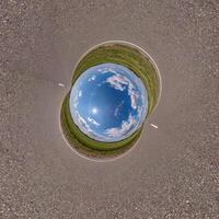 blue hole sphere little planet inside aspalt surface round frame background photo