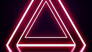 A tunnel of red neon triangles on black background. Abstract neon triangles fly away one by one forming tunnel video