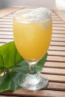 A Glass of Beras Kencur Float photo