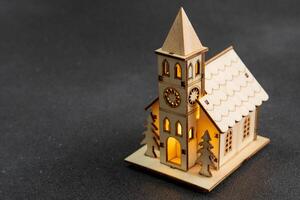 Toy church. Wooden chapel. Building model. photo