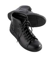 New black boots isolated on white background. Fashion footwear. Laces. Autumn winter and spring accessory. Convenient and comfortable casual shoes. A pair of low-speed boots photo