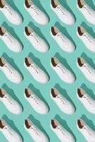 White sneakers pattern on background. The shoes are comfortable and casual. Background for a shoe store. photo