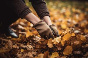 ai generado manos con guantes rastrillar otoño hojas. generar ai foto