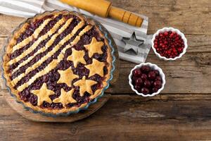 Step 4. After baking. Homemade cherry pie. Cake made from dough with stars. Food for 4th July USA Independence Day. American Pie. Sweet pastries. Berry open round tart. DIY photo