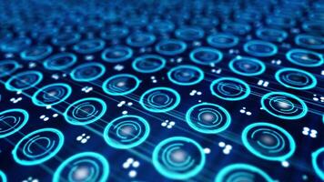 Pattern of small blue spinning circles and pixels moving on a electronic screen. Close-up of rotating neon circles. video