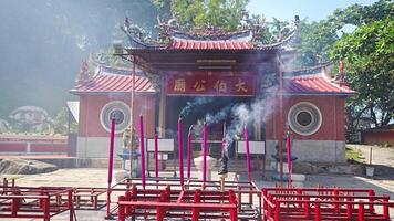 Georgetown, Malaysia - December 18, 2023. Incense in Thai Pak Koong Temple in Tanjung Tokong area in Georgetown, Malaysia. High quality 4k footage video