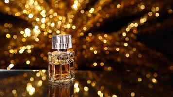 perfume bottle golden bokeh video