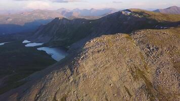 Aerial view on mountain peak with lake background. Amazing mountains landscape with ponds video