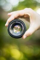 View of Camera Lens with bokeh effect photo