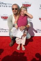 LOS ANGELES - AUG 11  Joseph Lawrence and daughter Charli Lawrence arrives to DisneyPixar Celebrates The Launch Of The World Of Cars Online at Bob's Big Boy on August 11, 2010 in Burbank, CA photo