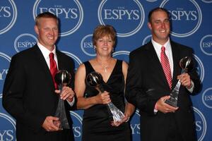 LOS ANGELES, JUL 14 - L-R The Thomas family, Aaron Thomas, Jan Thomas and Todd Thomas recipients of the Arthur Ashe Courage Award in the Press Room of the 2010 ESPY Awards at Nokia Theater, LA Live on July14, 2010 in Los Angeles, CA photo