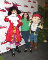 LOS ANGELES - OCT 18  Captain Hook, Ione Skye, Jake at the Jake And The Never Land Pirates Battle For The Book Costume Party Premiere at the Walt Disney Studios on October 18, 2014 in Burbank, CA photo