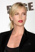 LOS ANGELES - SEPT 30  Charlize Theron arriving at  the RAGE Game Launch at the Chinatowns Historical Central Plaza on September 30, 2011 in Los Angeles, CA photo
