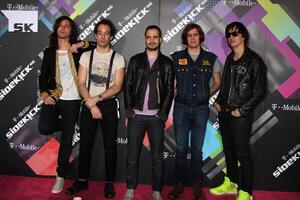 Musicians Nick Valensi, Albert Hammond Jr., Fabrizio Moretti, Nikolai Fraiture and Julian Casablancas of The Strokes photo