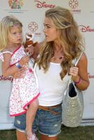 Denise Richards arriving at the A Time For Heroes Celebrity Carnival benefiting the Elizabeth Glaser Pediatrics AIDS Foundation at the Wadsworth Theater Grounds in Westwood  CA on June 7 2009 photo