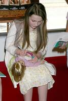 Abigail Breslin at an appearance promoting her Kit Kittredge Movie American Girl Store The Grove Shopping Center Los Angeles, CA May 16, 2008 photo