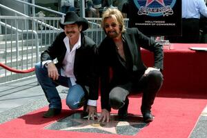 Kix Brooks  Ronnie Dunn Brooks  Dunn receive a star on the Hollywood Walk of Fame on Hollywood Blvd in   Los Angeles, CA August 4, 2008 photo