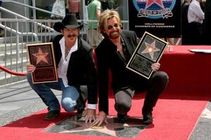 Kix Brooks  Ronnie Dunn Brooks  Dunn receive a star on the Hollywood Walk of Fame on Hollywood Blvd in   Los Angeles, CA August 4, 2008 photo