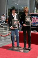 Kix Brooks  Ronnie Dunn Brooks  Dunn receive a star on the Hollywood Walk of Fame on Hollywood Blvd in   Los Angeles, CA August 4, 2008 photo