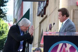 James Cameron  Arnold Schwarzenegger  at the Hollywood Walk of Fame Ceremony for James Cameron Egyptian Theater Sidewalk Los Angeles,  CA December 18, 2009 photo