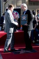 Arnold Schwarzenegger  James Cameron  at the Hollywood Walk of Fame Ceremony for James Cameron Egyptian Theater Sidewalk Los Angeles,  CA December 18, 2009 photo