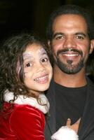 Adrienne Frantz  Kristoff St John  his daughter Lola Children's Heart Institue Fund Gala Hyatt Regency La Jolla LaJolla,  CA November 3, 2007 photo