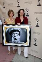 Cathy Silvers left and sister Nancey at the USPS Stamp Unveiling of Stamps honoring  Early Television Memeoris at the TV Academy in No Hollywood, CA  on August 11,  2009   2009 photo