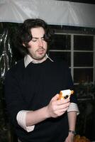 Jason Reitman checking out the Flip video camera GBK Productions Oscar Gifting Suite Boulevard3 Los Angeles, CA February 22, 2008 photo