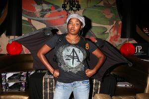 Shar Jackson wearing a pair of play Batman wings from Mattel promoting the Dark Knight movie GBK MTV Movie Awards Gifting Suites  Crimson  Opera Los Angeles,  CA May 31, 2008 photo