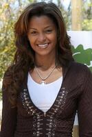 Claudia Jordan arriving at the Green Hollywood Tree Planting at TreePeople's Headquarters in Coldwater Canyon Park  in Los Angeles, CA on April 16, 2009 photo