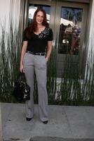 Amanda Righetti arriving at the 7th Annual John Varvatos Stuart House Benefit at the John Varvatos Store in West Hollywood, CA  on March 8, 2009 photo