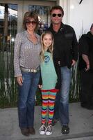 Lisa Rinna  Harry Hamlin, daughter arriving at the 7th Annual John Varvatos Stuart House Benefit at the John Varvatos Store in West Hollywood, CA  on March 8, 2009 photo