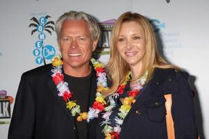 Lisa Kudrow  husband Michel  arriving at the Grand Opening of The Jon Lovitz Comedy Club at Universal City Walk in Los Angeles, CA  on May 28, 2009   2009 photo