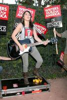 K.T. Tunstall performs on the picket line supporting striking WGA Writers Outside the Disney Studios Burbank, CA November 14, 2007 photo