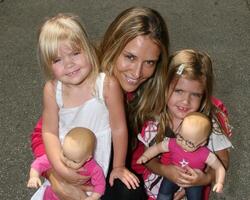 Brooke Mueller Sheen and her step-daughters Sam  Lola Sheen shopping at The Grove piror to the premiere of Kit Kittredge  in Los Angeles, CA June 14, 2008 photo